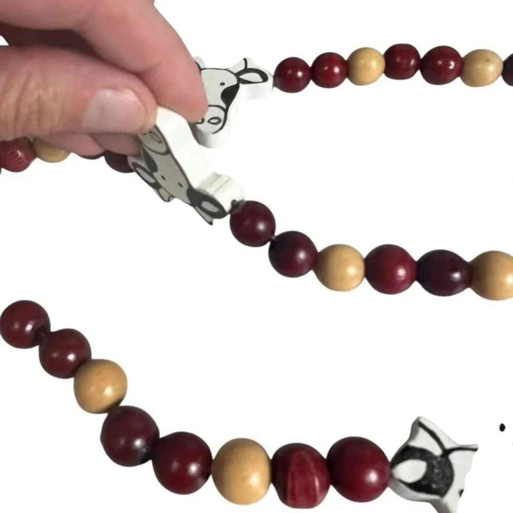 Black & White Cow Garland Possibly Hand Made Of Wood Approx 110 Inches Long READ